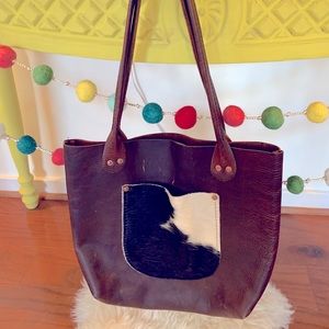 Leather tote with fur pocket